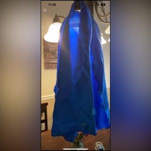 Six children’s multi-color capes